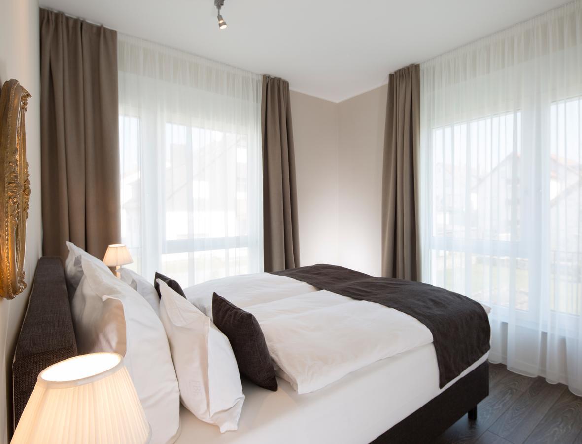 Logis First Class Business Suites Реннинген Экстерьер фото